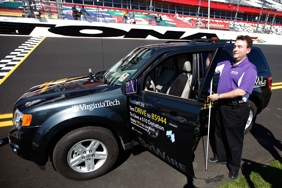 National Federation of the Blind president Mark Riccobono preparing to drive the car developed by the organization’s Blind Driver Challenge in 2011.