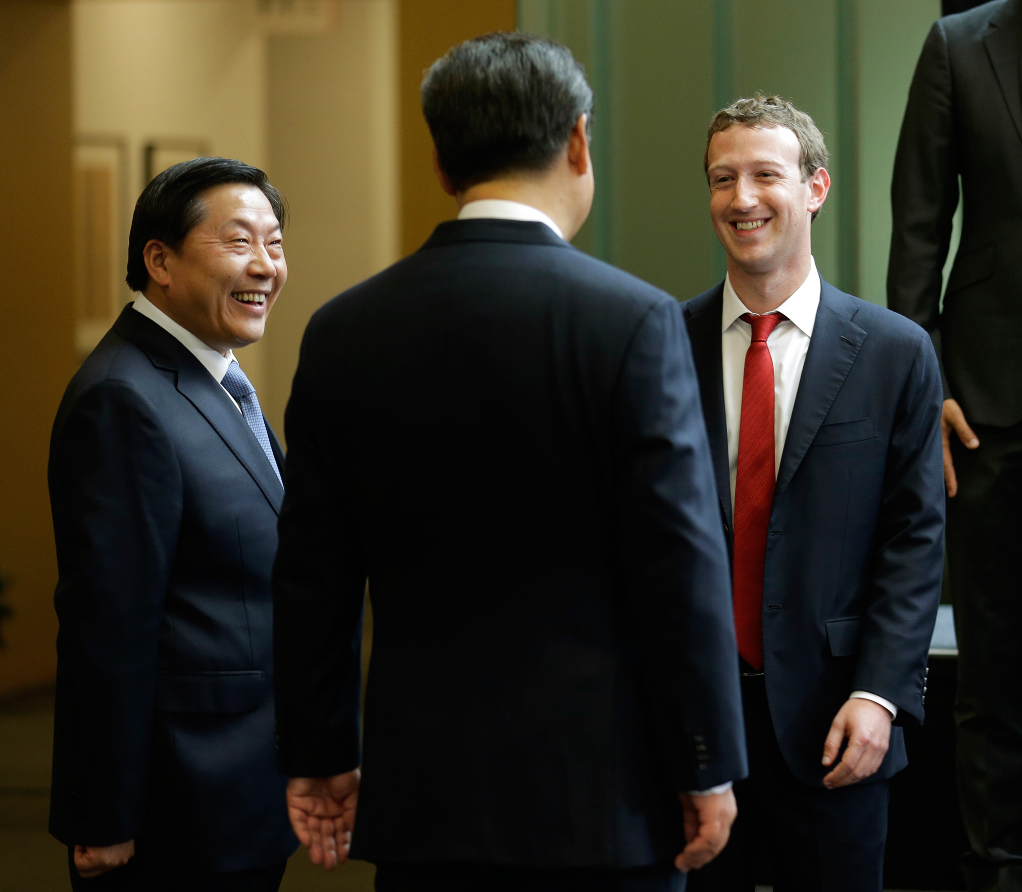 Lu Wei, China's Internet czar (left), speaks with Facebook CEO Mark Zuckerberg and Chinese president Xi Jinping at a meeting in 2015.