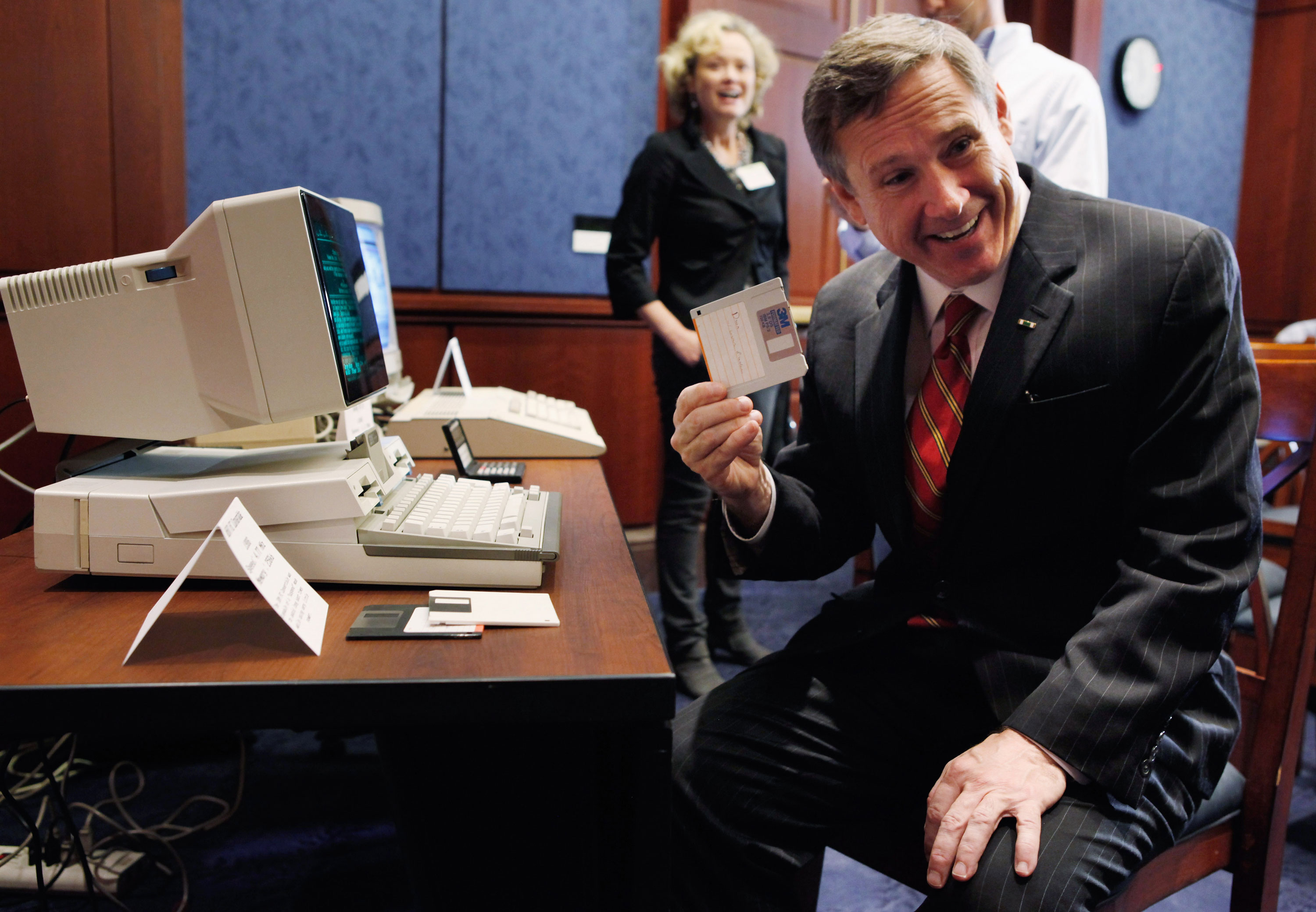 Lawmakers including former U.S. Senator Mark Kirk, seen here holding up a floppy disk in 2011, have been calling for reforms to the Electronic Communications Privacy Act for years.