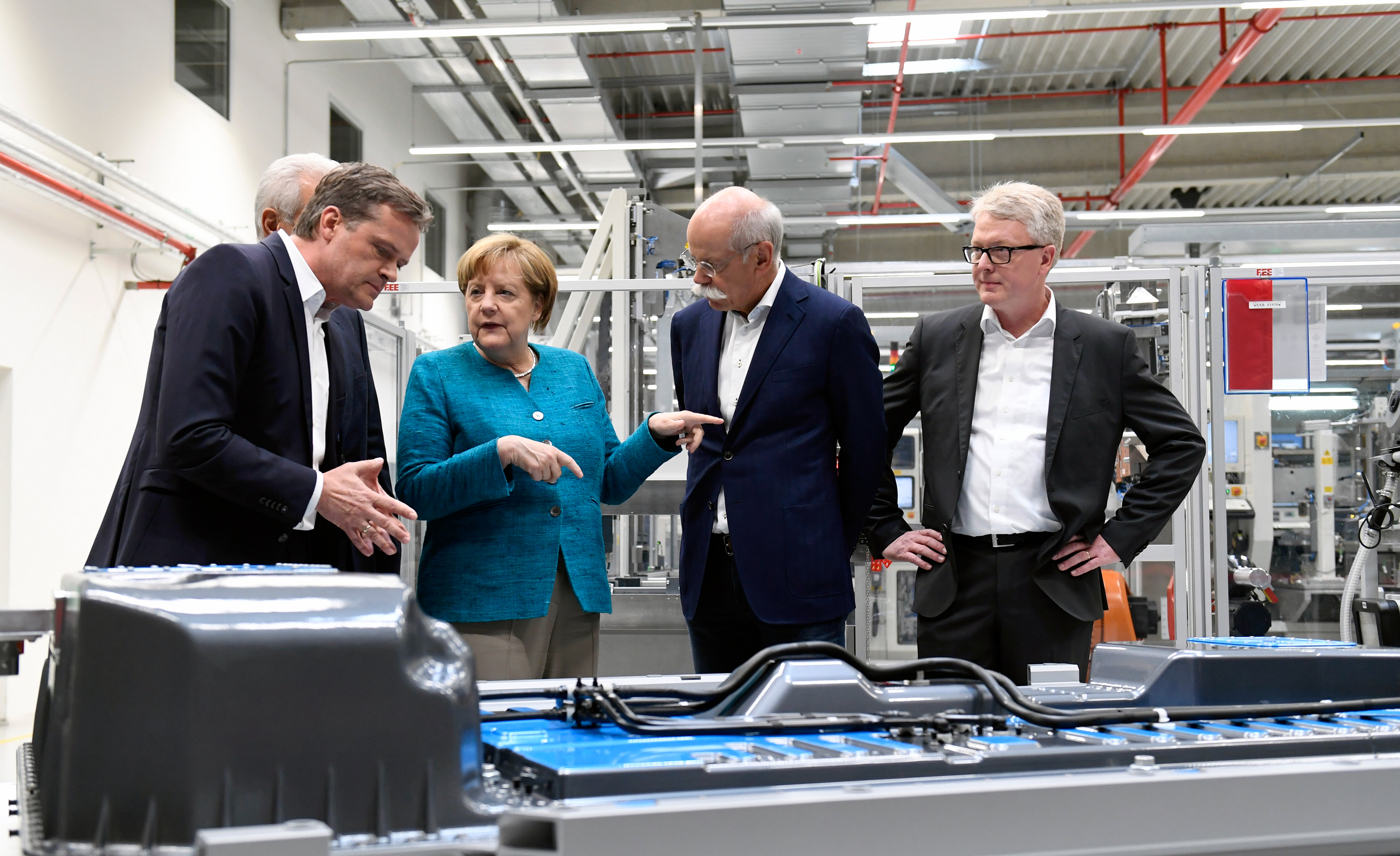 German chancellor Angela Merkel visits Accumotive's plant in Kamenz, Germany.