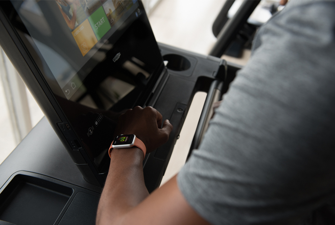 Starting in the fall, the Apple Watch will be able to communicate with gym equipment to track your workouts, as this image from the company shows. To build the algorithms behind this activity tracking, Apple has a secretive AI gym where it gathers data from employee testers.
