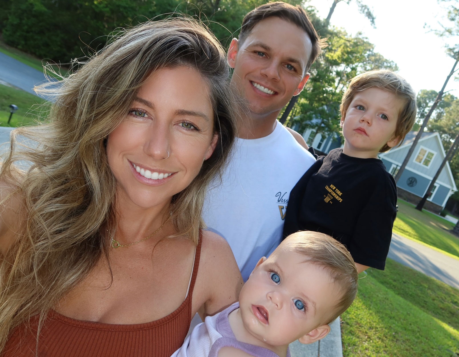 Brody Devault with his parents and baby sister